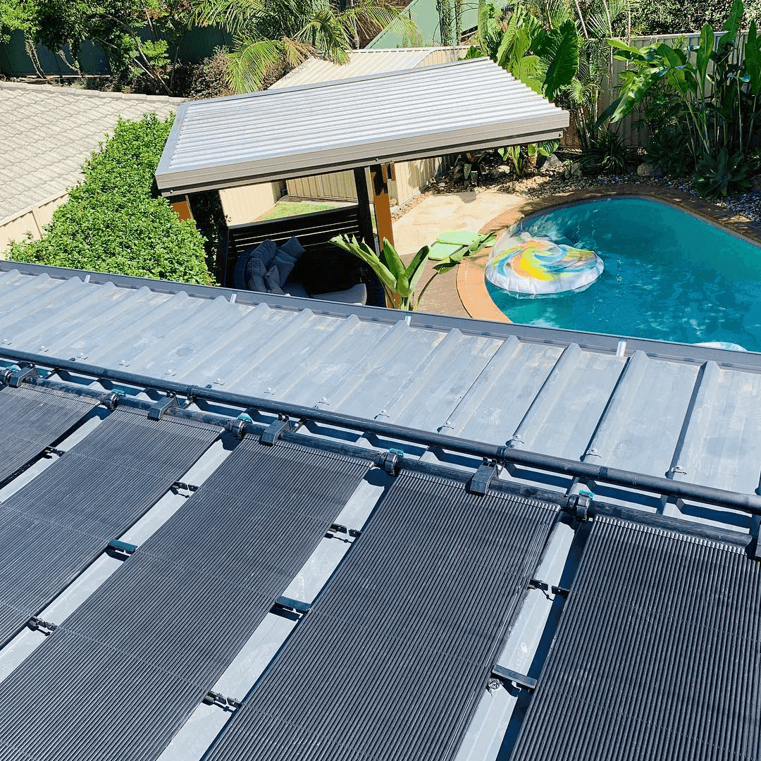 Solar pool heating panel on roof